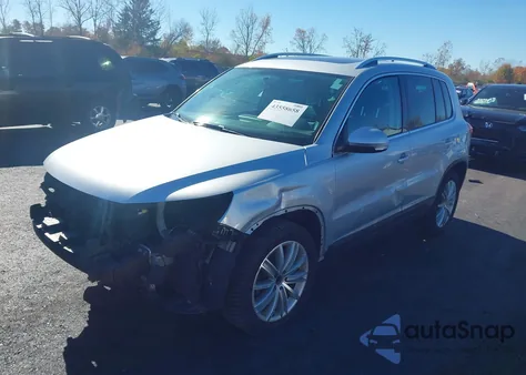 2014 Volkswagen Tiguan Sel из США, поврежденный, VIN WVGBV3AXXEW620250